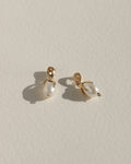 Clutched Pearl Charm