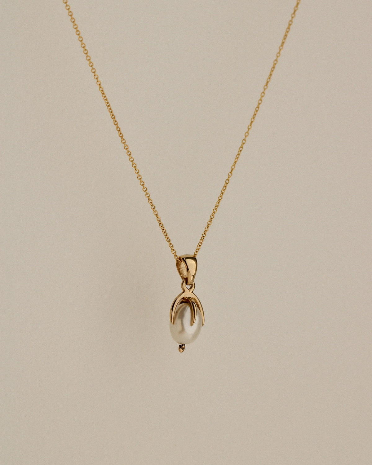 Clutched Pearl Charm