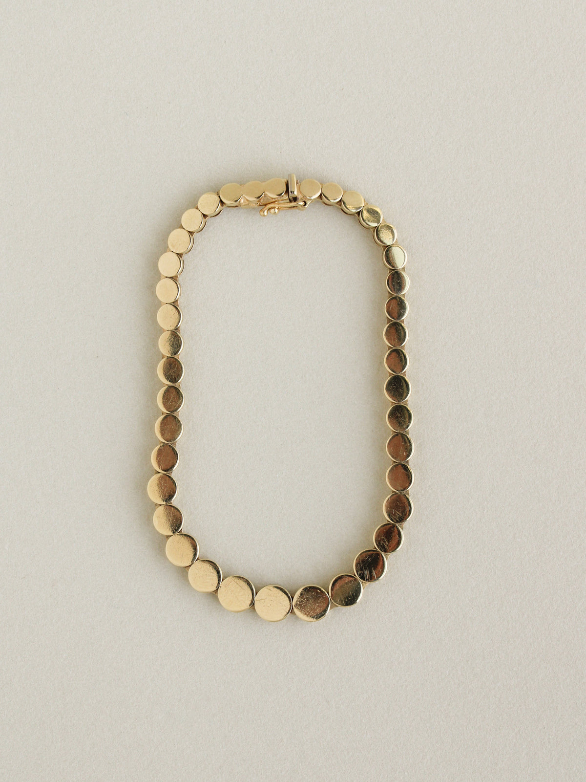 Graduated Disc Chain Bracelet