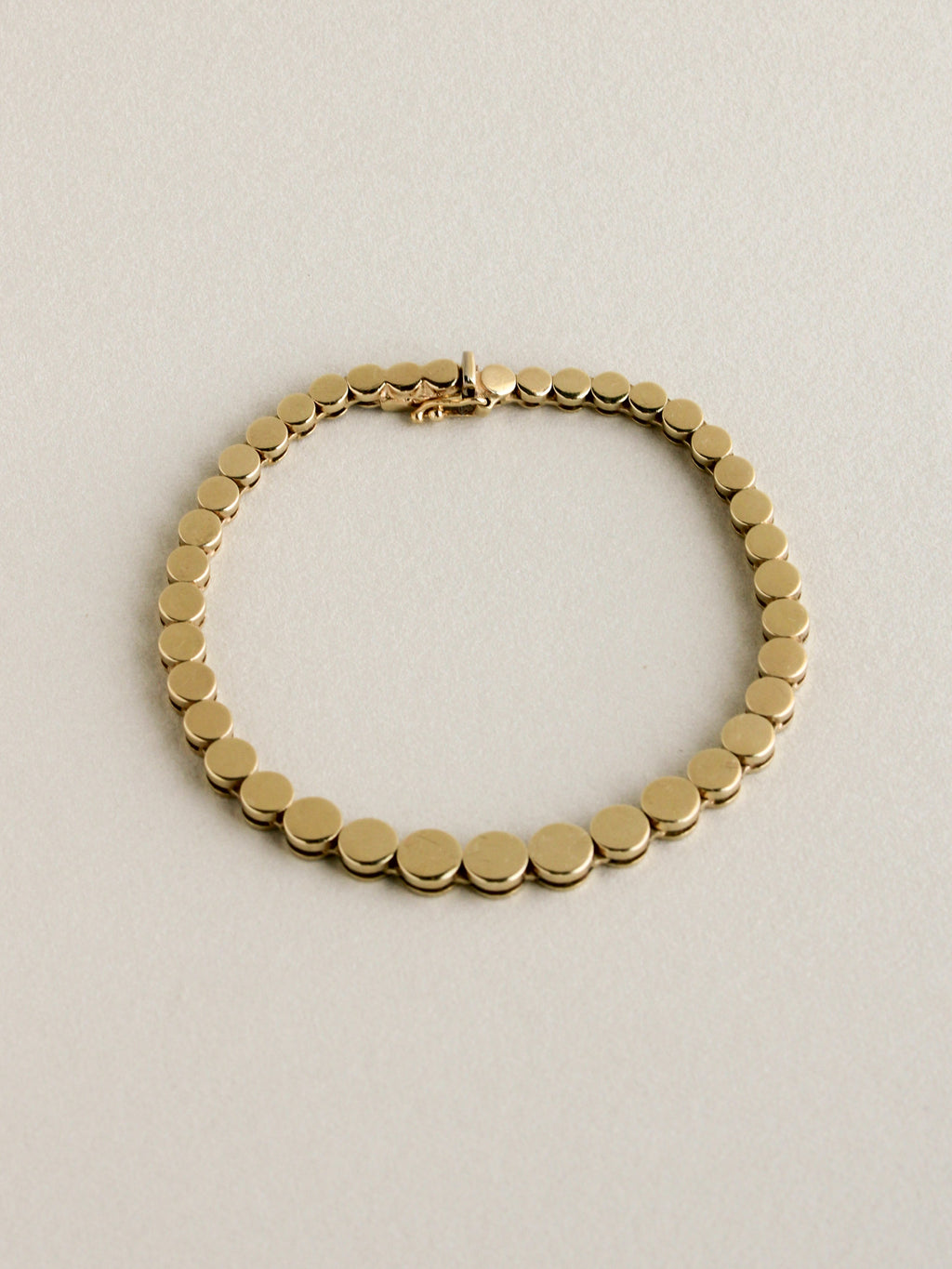 Graduated Disc Chain Bracelet