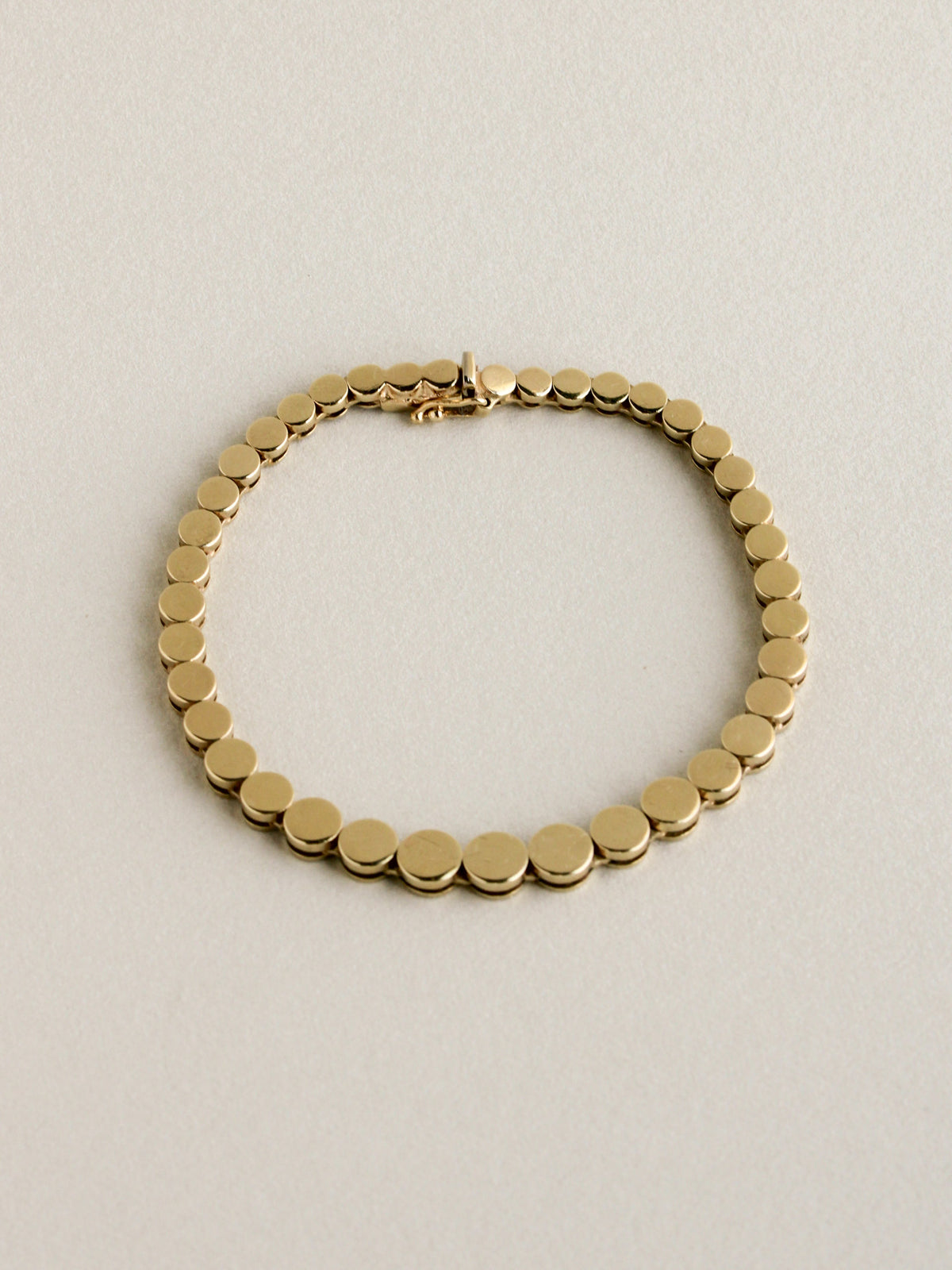 Graduated Disc Chain Bracelet
