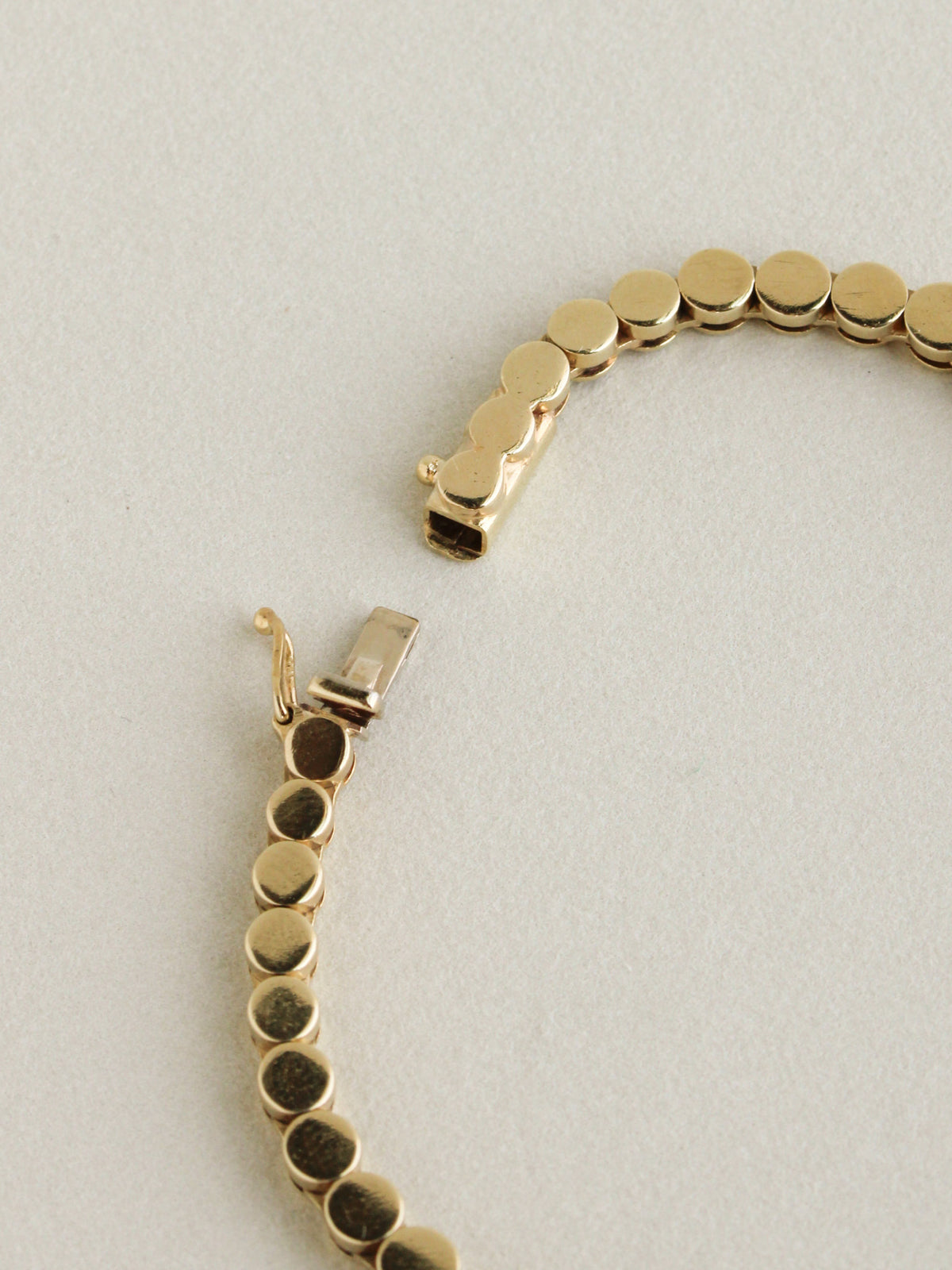 Graduated Disc Chain Bracelet