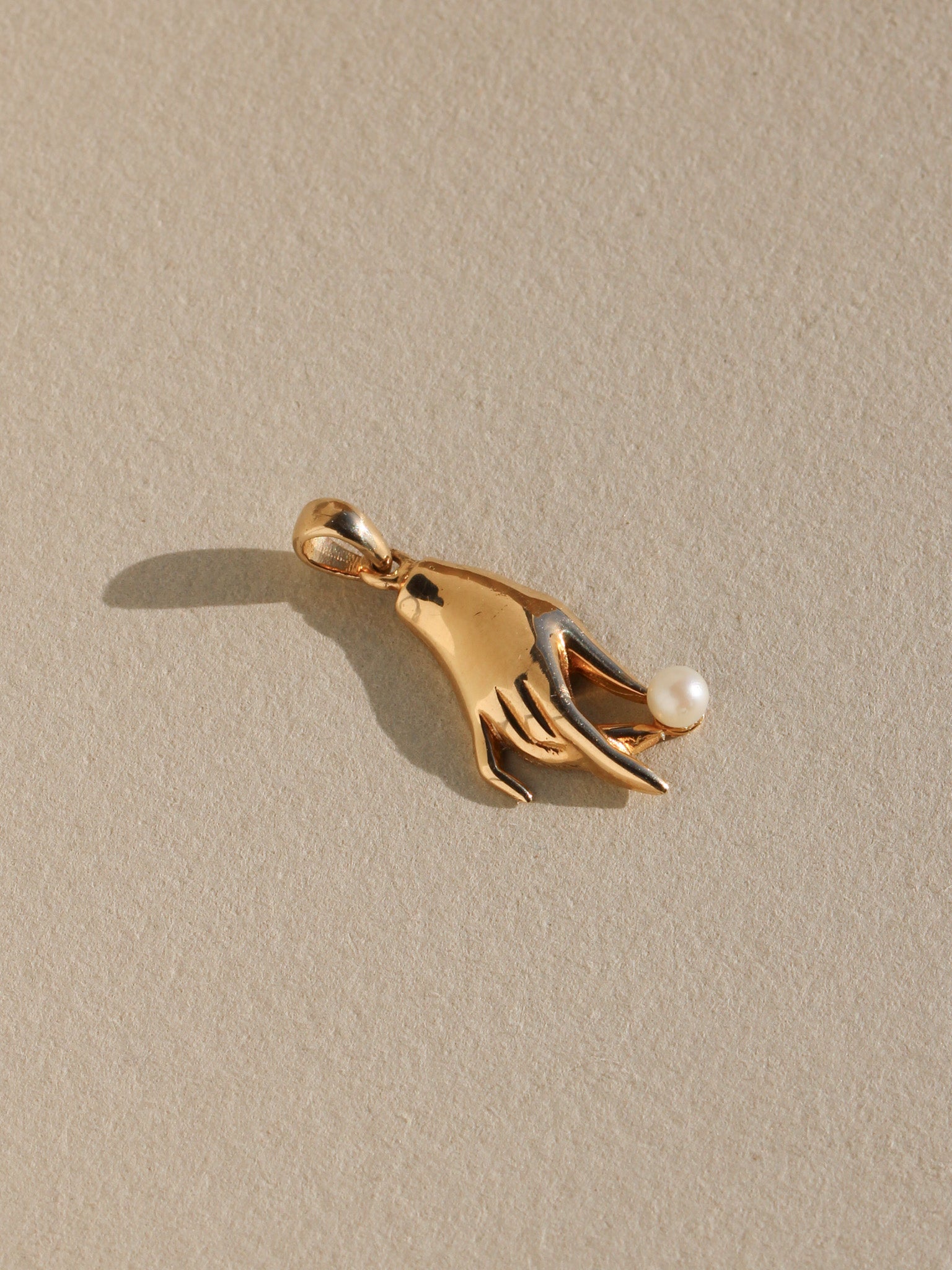 Hand & Pearl Charm