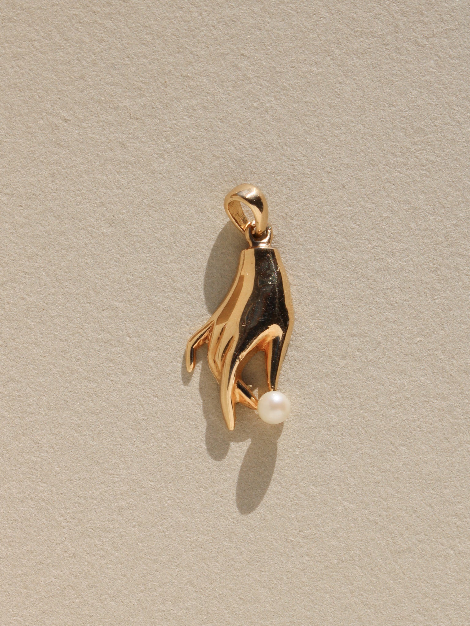 Hand & Pearl Charm